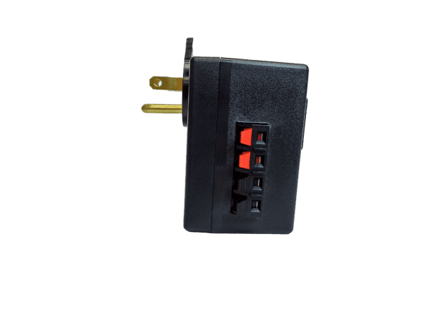 A black power plug with red and yellow buttons.