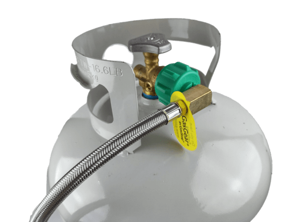 A gas tank with a hose attached to it.